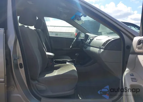 2002 Toyota Camry Le from USA, damaged, VIN JTDBE32K920049565